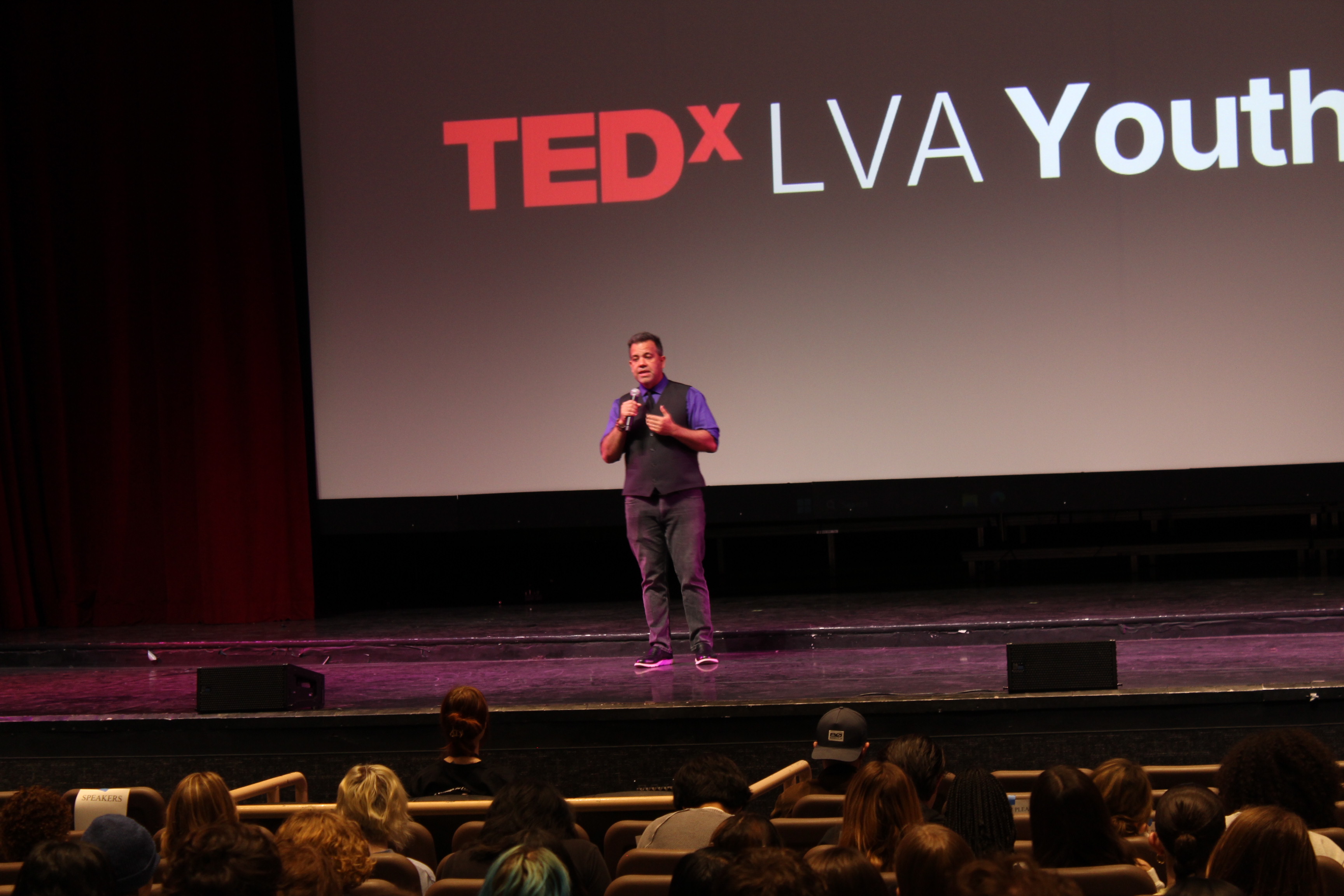 Millian Quinteros on the TEDx LVA stage